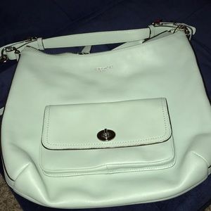 Coach mint green crossbody bag.